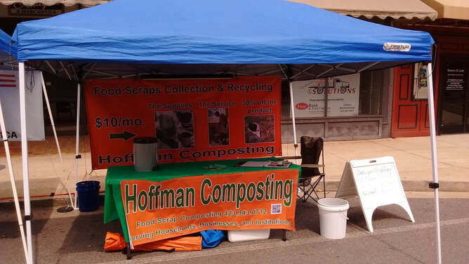 compost business vendor tent at an event