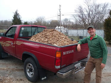 pickup truck loaded with mulch